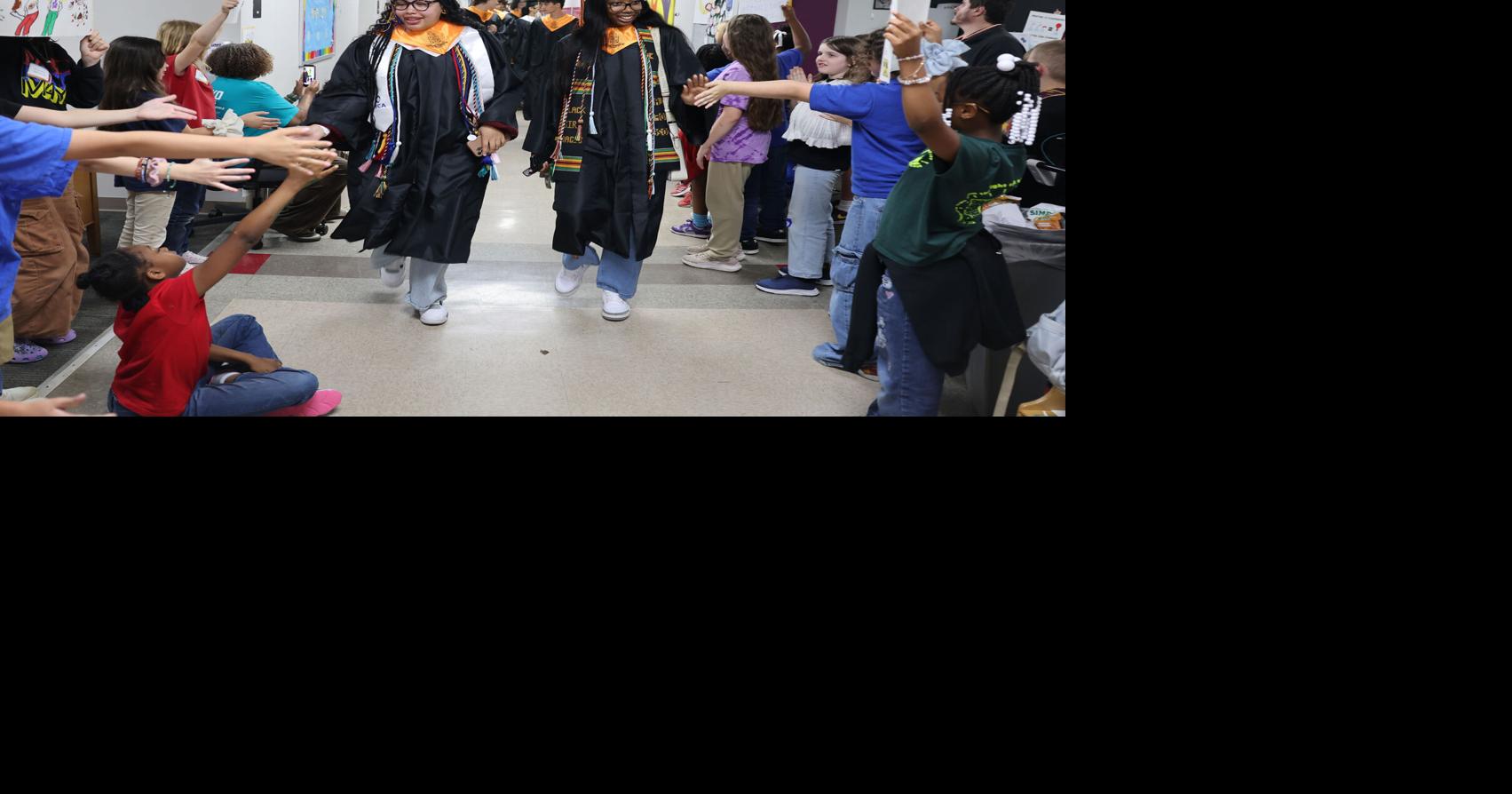 Now-graduating class of Mayo Demonstration School pioneers reunite to walk its halls
