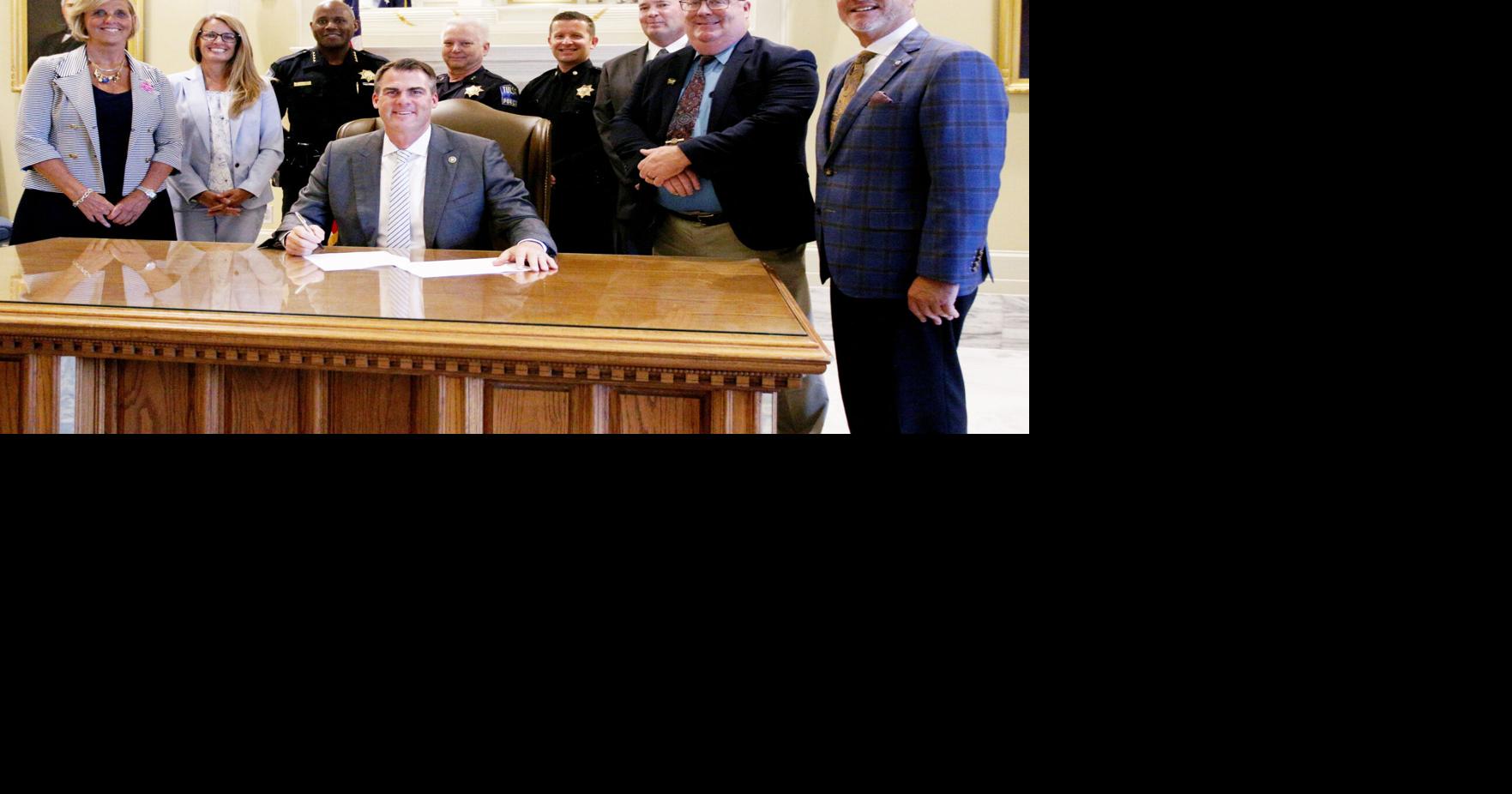 Gov. Kevin Stitt ceremonial signing of House Bill 1001, the Sgt. Craig