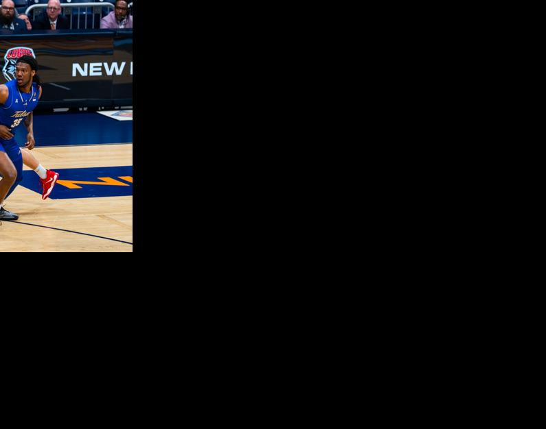 Riley, Golden Hurricane dance to the NIT title game