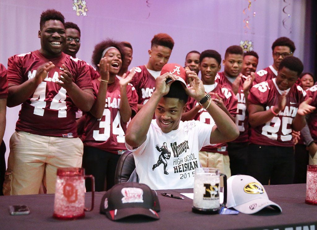 Alabama running back Josh Jacobs poses with his new team jersey