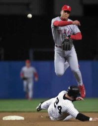 Tino Martinez homers twice against Rangers 