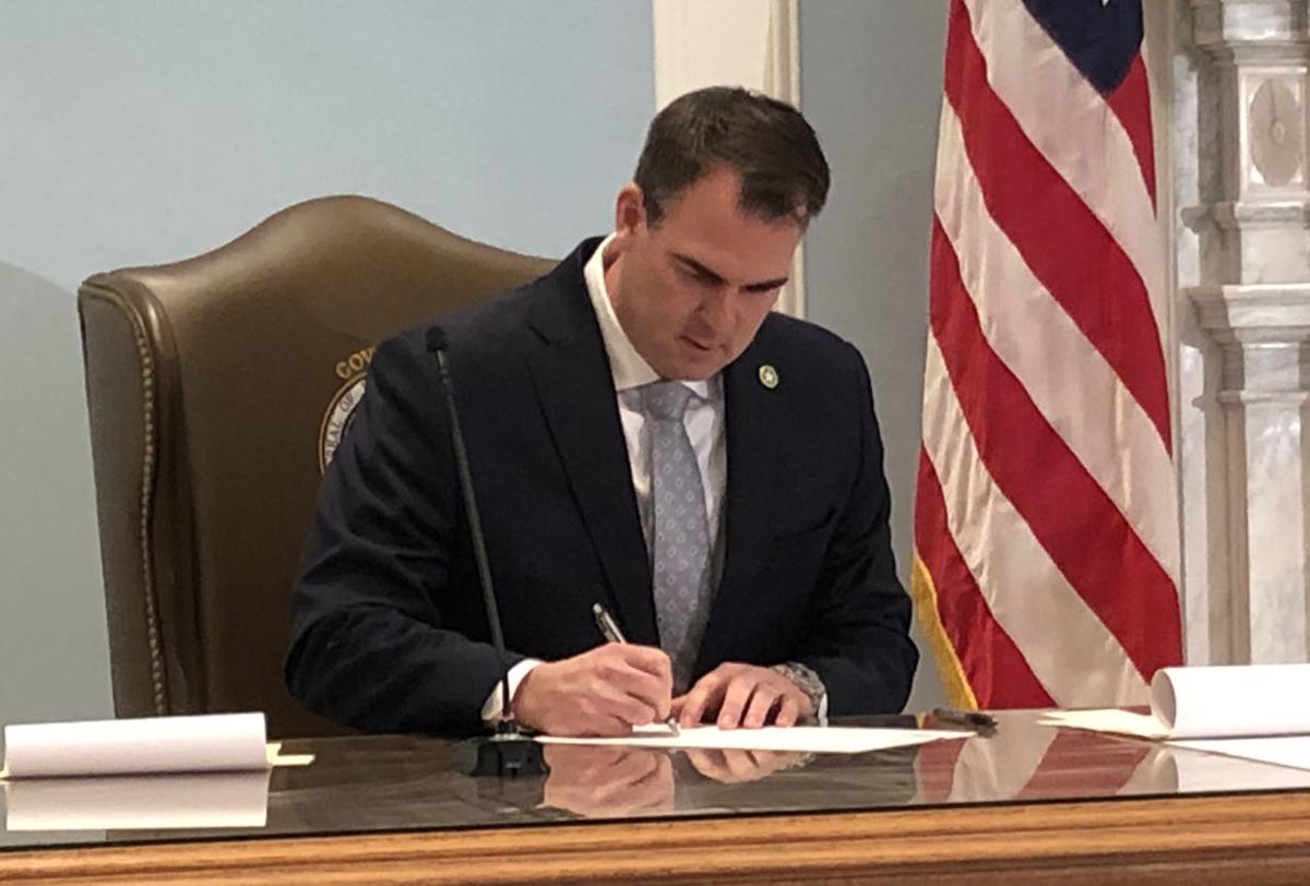 Stitt signs bills