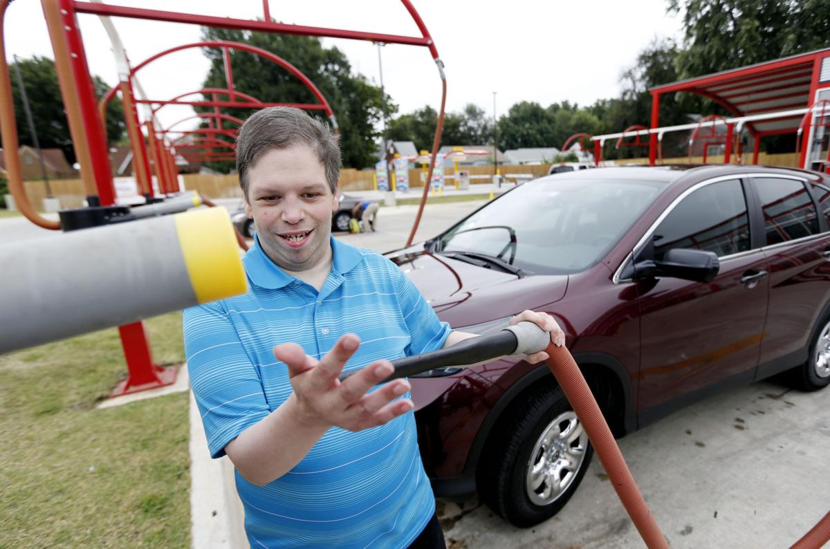 Car wash obsession unlocks world for �Mr. Car Wash