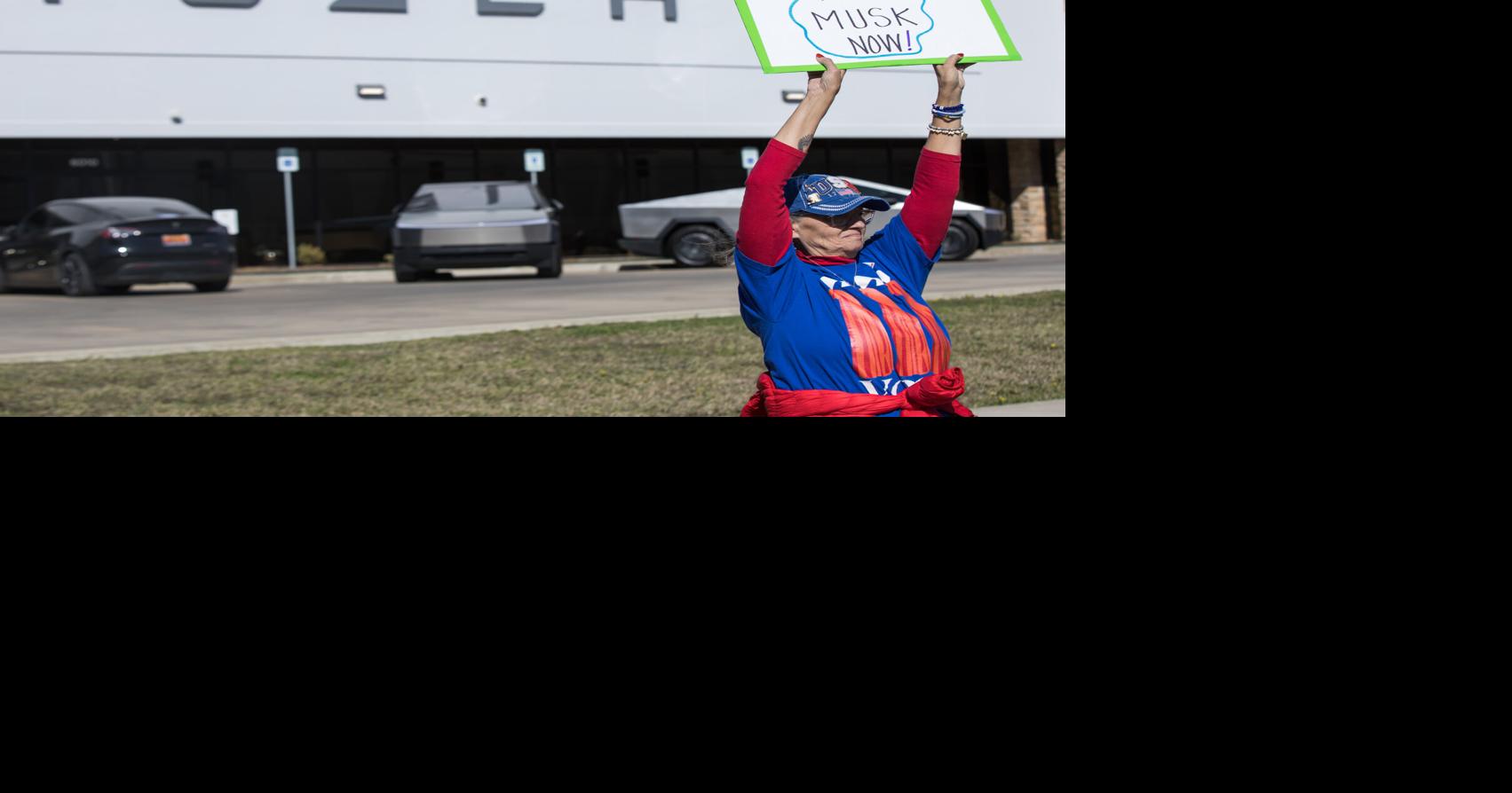 Protest held in front of a Tesla dealership in Tulsa