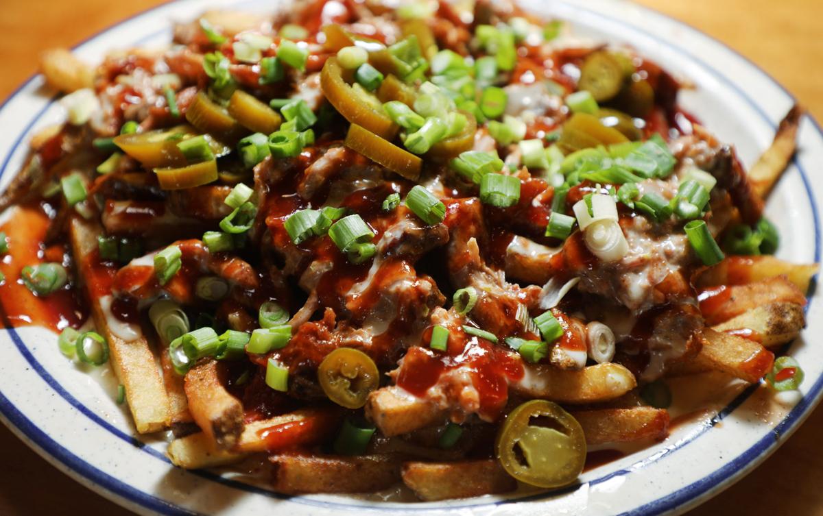 Review: Decor, food draw fans to Stone Mill BBQ ...