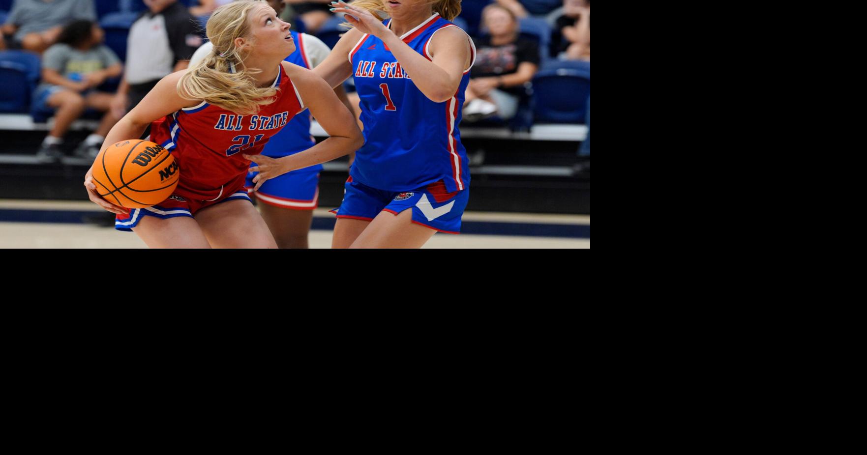 Coverage image for: The West's Abbie Myers of Kingfisher dribbles beside the East's Kate Datel of Bixby during the large school girls basketball (copy)
