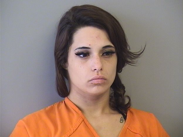 Woman charged, arrested for allegedly burying handgun used in June ...