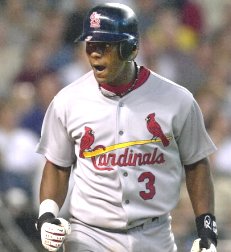 St. Louis Cardinals Edgar Renteria connects for a three-run