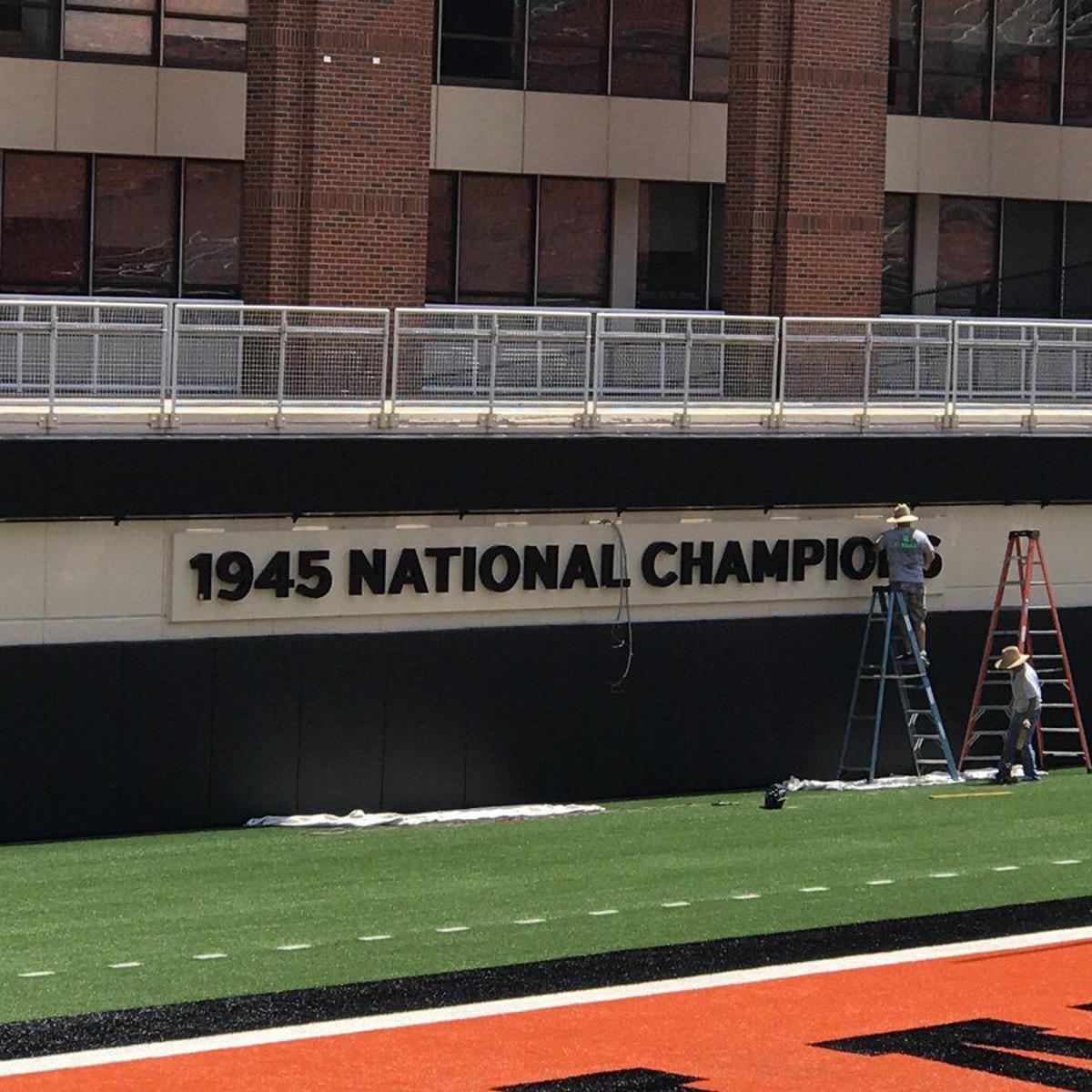 Oklahoma State Places 1945 National Champions Sign At Boone