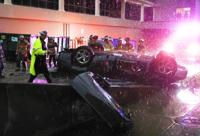 Car Falls from Parking Garage