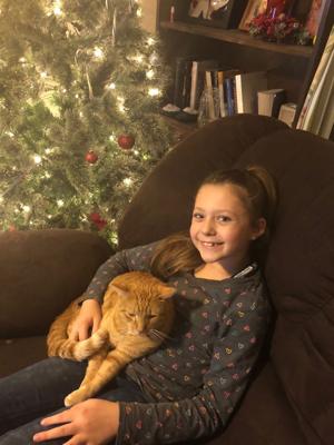 Video: Nebraska girl overcome with emotion after reuniting with lost cat after 2 years