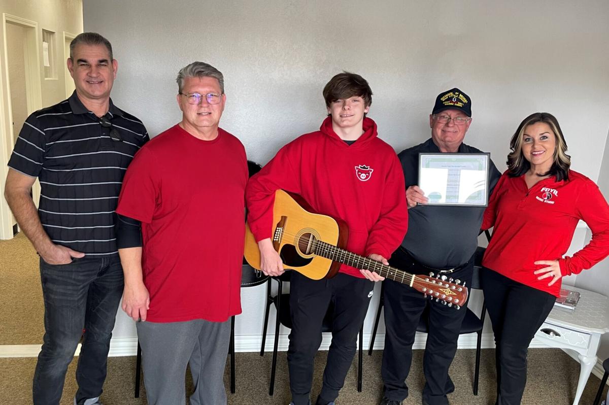 Owasso music student awarded refurbished 12string Alvarez guitar