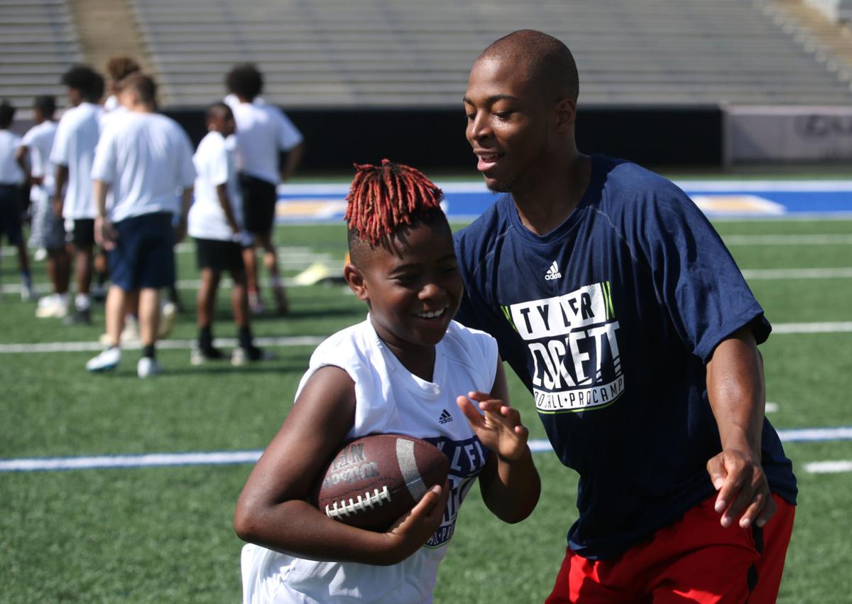 NFL's Tyler Lockett donates to Tulsa Day Center