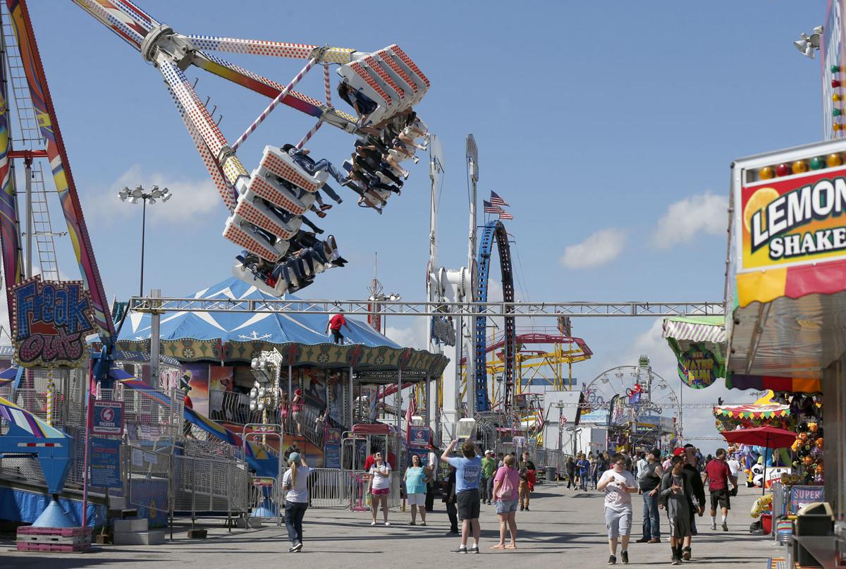 Photo gallery Livestock, rides and the wall, a day at the Tulsa State Fair