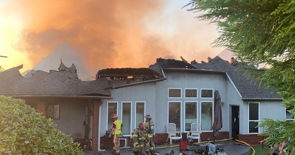 Firefighters battle south Tulsa house fire in triple-digit heat index