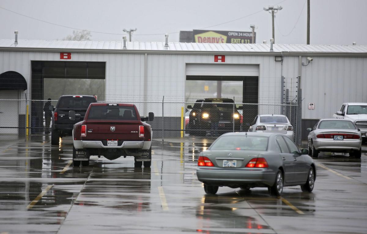 Tulsa auto auction moves online as city continues shelter