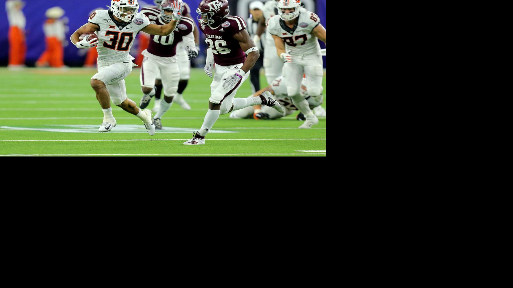 Texas A M 24 Osu 21 Hubbard Johnson Have Big Games But Cowboys