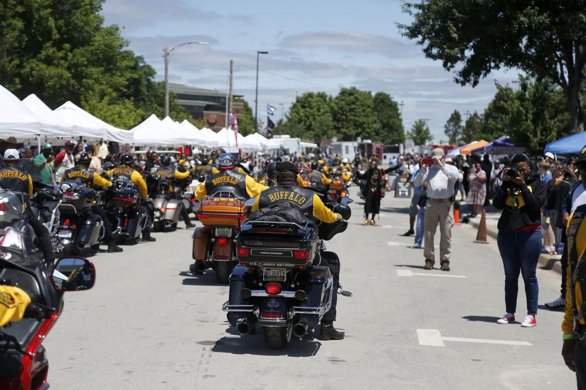 Hundreds gather for candlelight vigil to honor 1921 Tulsa Race Massacre