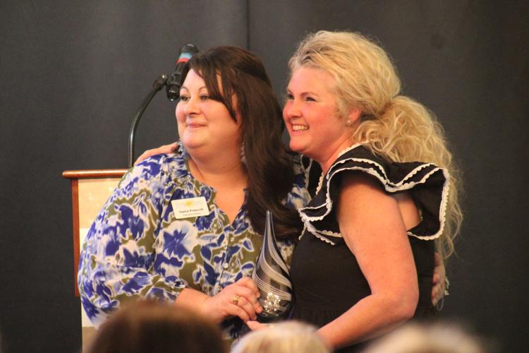 (Left to right) Tasha Prescott, executive director of the Young Audiences of Northeast Texas, with Laura Hogan, the recipient of the Arts Teaching Excellence Award for Elementary School. Hogan is the art teacher at Brown Elementary School of Whitehouse ...