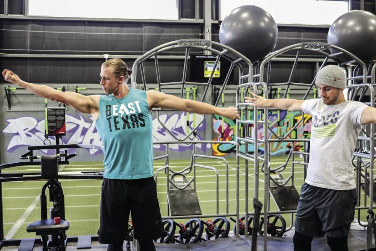 Michael Kopech looks on during spring training workouts on