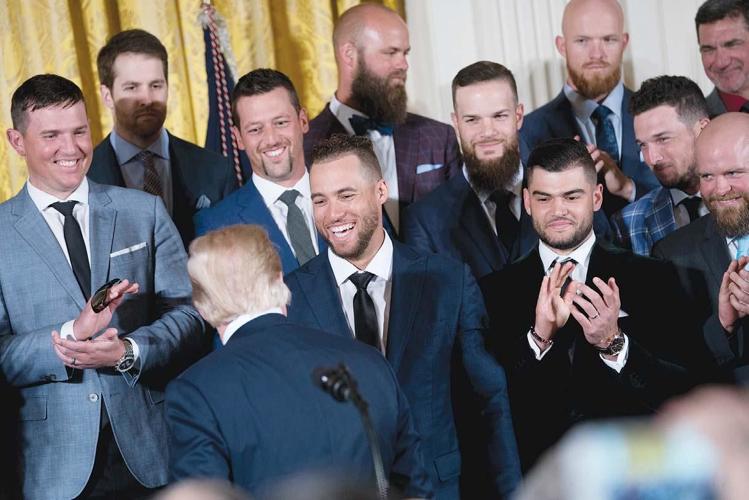 Josh Reddick presents President Trump with an Houston Astros jersey