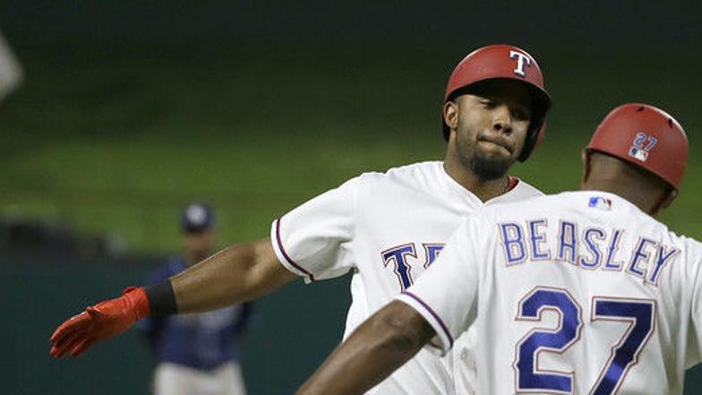 Rangers' Elvis Andrus breaks elbow after getting hit