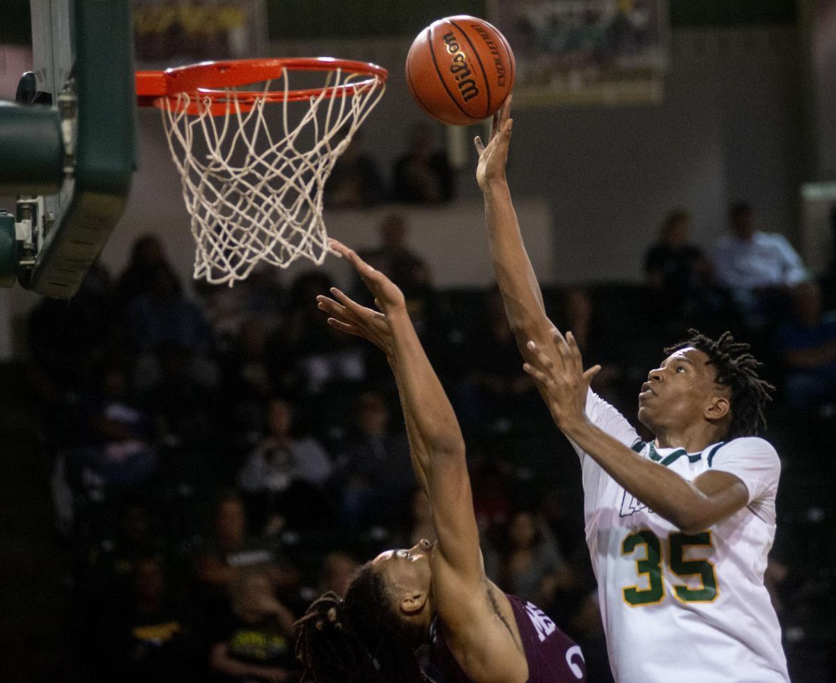 Longview S Malik Henry Commits To Play Basketball For George Mason