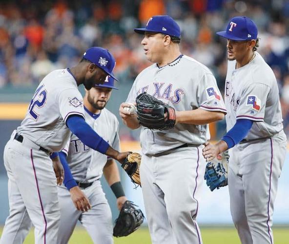 Big Bartolo still having fun, getting batters out for Rangers