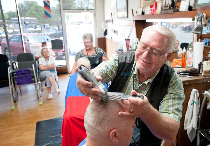 After 52 Years Barber Keeps Cutting Singing Business