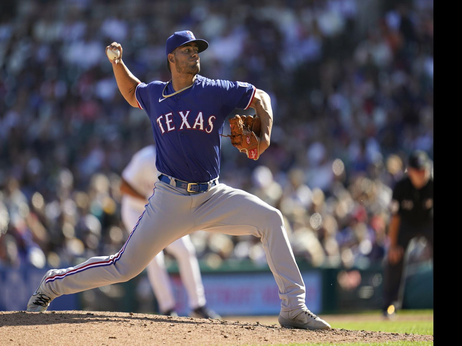 Tigers pound 3 HRs, beat Rangers 14-7 to end 6-game skid