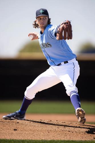 Logan Gilbert throws a bullpen session Sunday (Dean Rutz / The