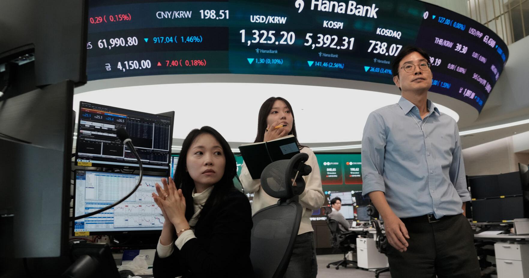 World shares are mixed after Wall Street AI - related losses , while oil prices jump