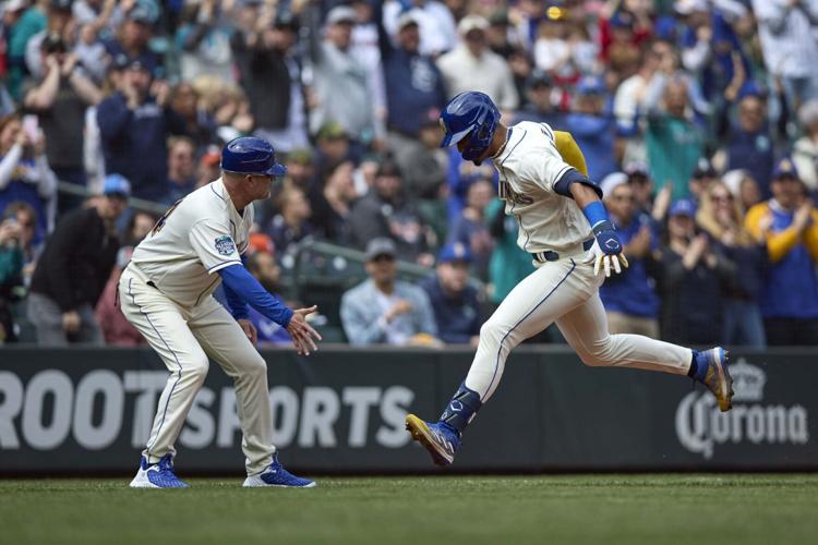 Dodgers wrap up NL West title with 6-2 win over Mariners