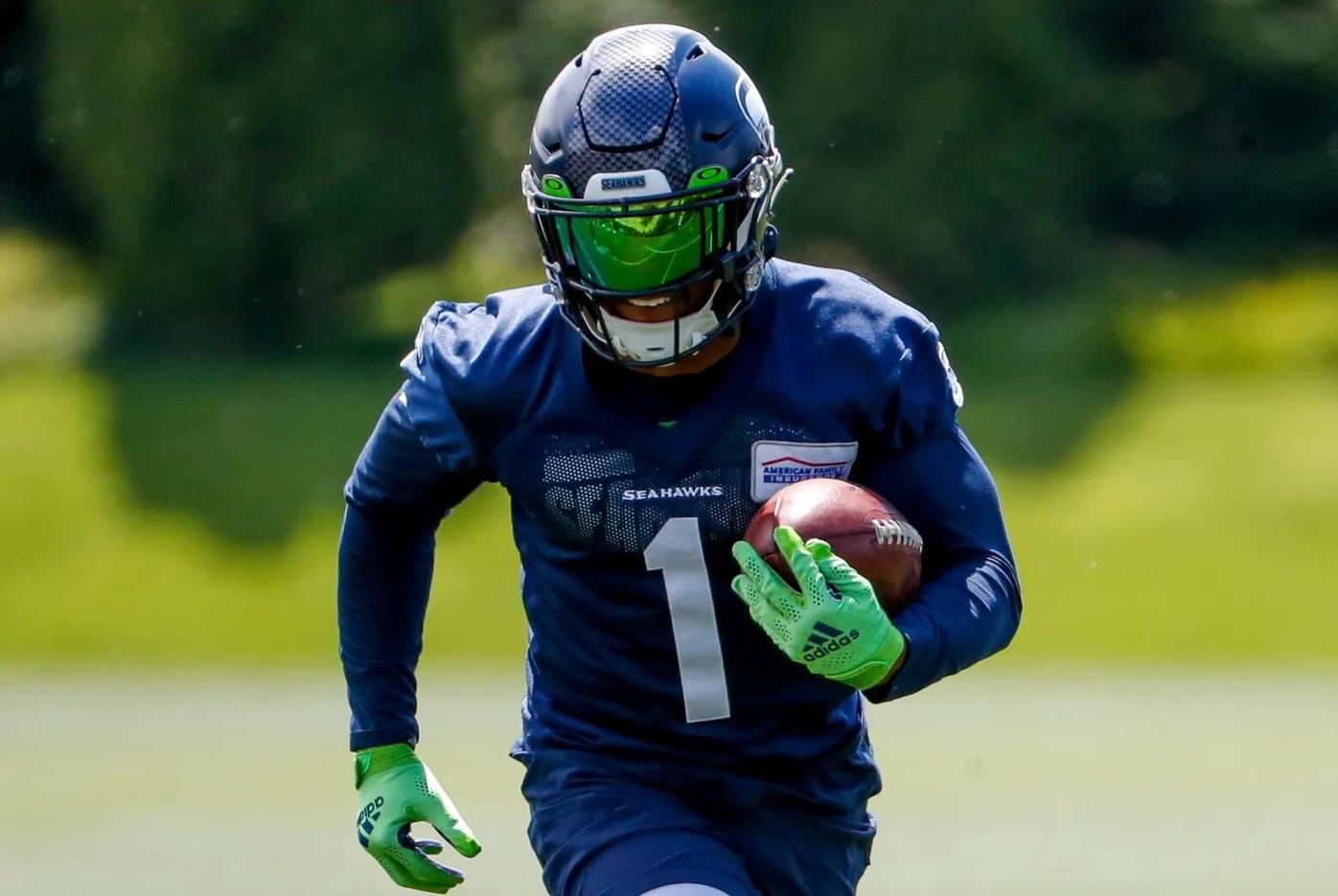DK Metcalf and Tariq Woolen injuries add to the growing Seahawks