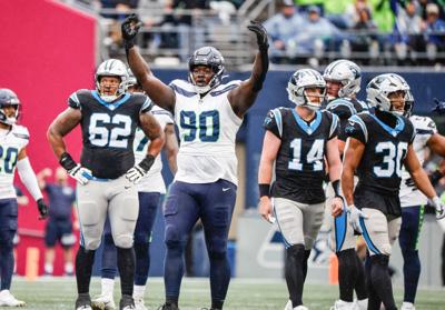 Seahawks' Geno Smith: 12s 'got us a win' helping force eight Panthers false  starts