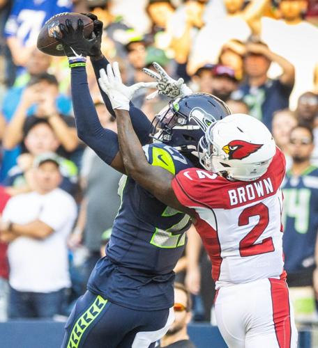 Seahawks rookie cornerback Tariq Woolen continues strong start with another  interception, Seahawks