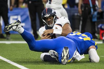 Broncos get blown out by Rams; Russell Wilson throws 3 INTs - ESPN