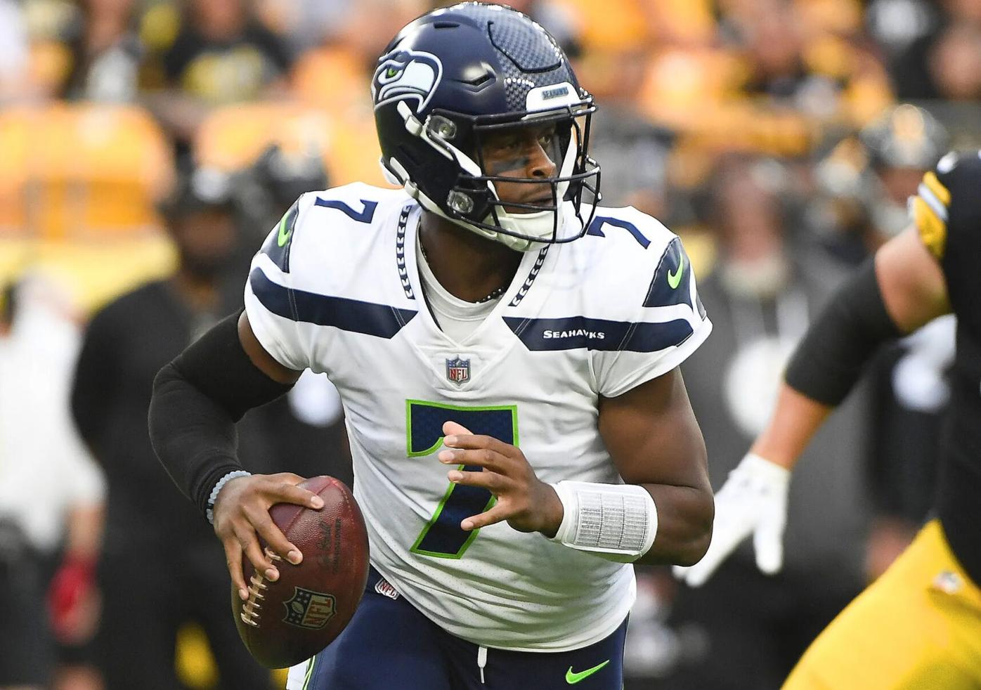 Seattle Seahawks quarterback Geno Smith (7) holds the ball while