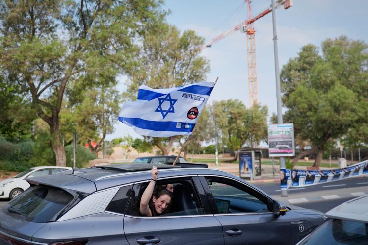 Union Vote Sticker Israelis head to the polls with Netanyahu’s future at stake, in photos ...