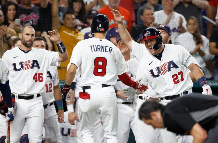 Trea Turner of The United States celebrates with teammates after