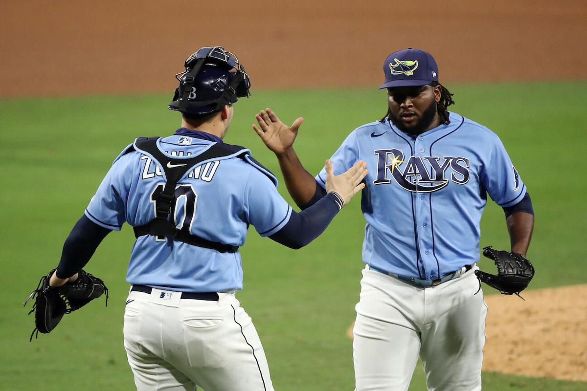 Snell wins No. 21 as Rays beat Blue Jays 5-2