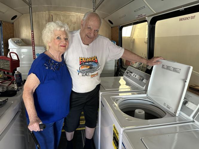 Nonprofit organization celebrates completion of free mobile laundromat
