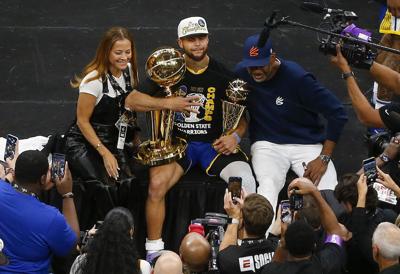 At long last, Warriors guard Steph Curry claims his first NBA Finals MVP  trophy - The Boston Globe