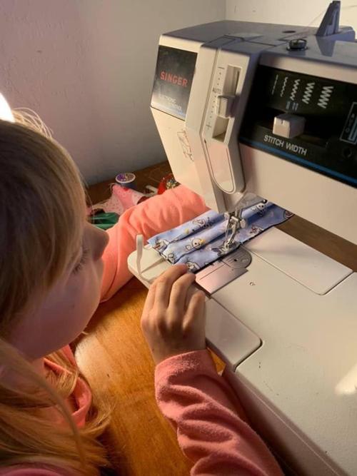 Emma sewing masks for hospital