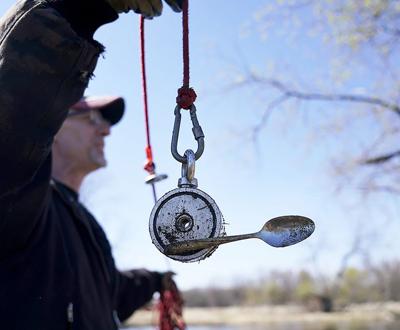 Magnet fishers seek sunken treasure, be it antique tools, Lifestyle