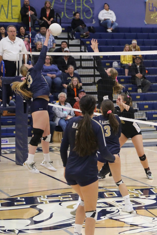 Raiders attacker Grace Mathias, number 33, gets up to contest a point against the Sonora Wildcats varsity volleyball team Thursday night in a second-round match of the 2019 CIF Sac-Joaquin Section Volleyball Division III playoffs in Modesto.
