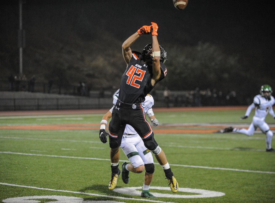 Summerville High's (42) Titus Shirley leaps up to try to catch a pass thrown to him during the high school game between the Sonora High School Wildcats and Summerville High School Bears at Summervilles Thorsted Field on November 1, 2019 in Tuolumne, CA.