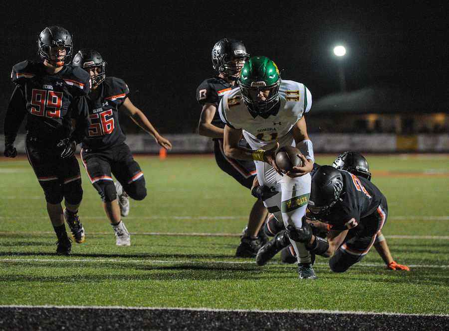 Sonora High's (11) Nick Crockett runs towards the end zone during the high school game between the Sonora High School Wildcats and Summerville High School Bears at Summervilles Thorsted Field on November 1, 2019 in Tuolumne, CA.