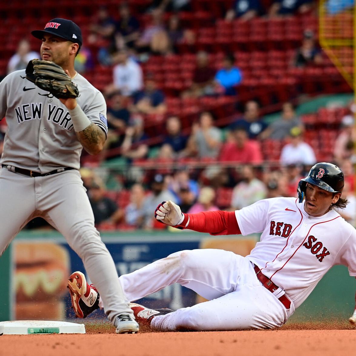 New York Yankees' Giancarlo Stanton runs the bases after hitting a two-run  home run off Boston Red Sox starting pitcher Nick Pivetta in the sixth  inning of a baseball game, Saturday, April