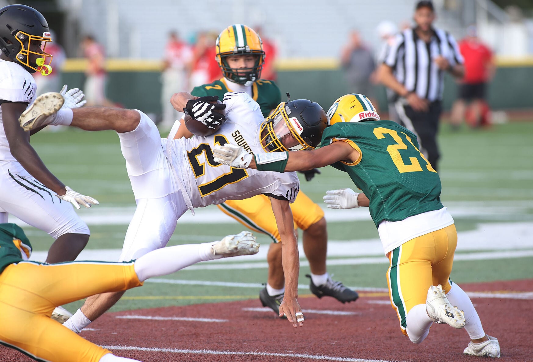 Bishop Guertin football players celebrating a touchdown during a 2024 game